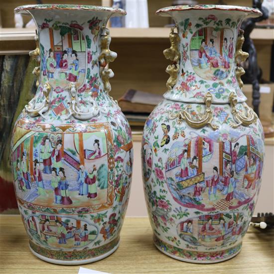 A pair of Chinese famille rose vases, 19th century